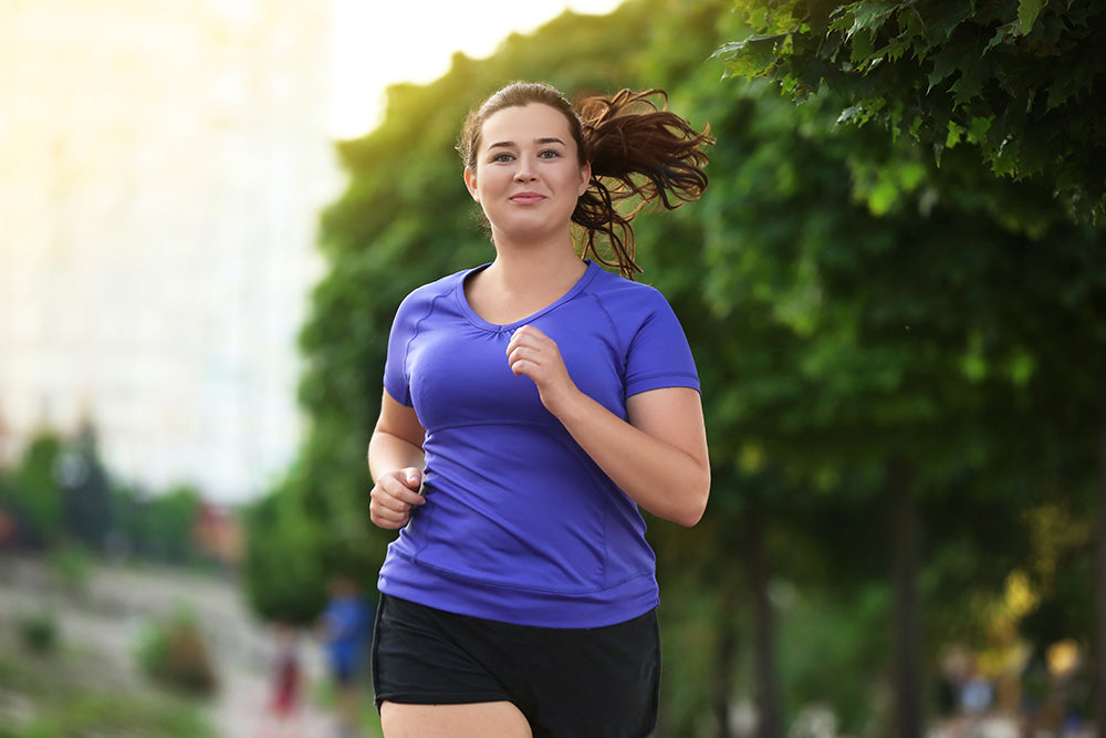 Healthy Woman runs along Ottawa canal